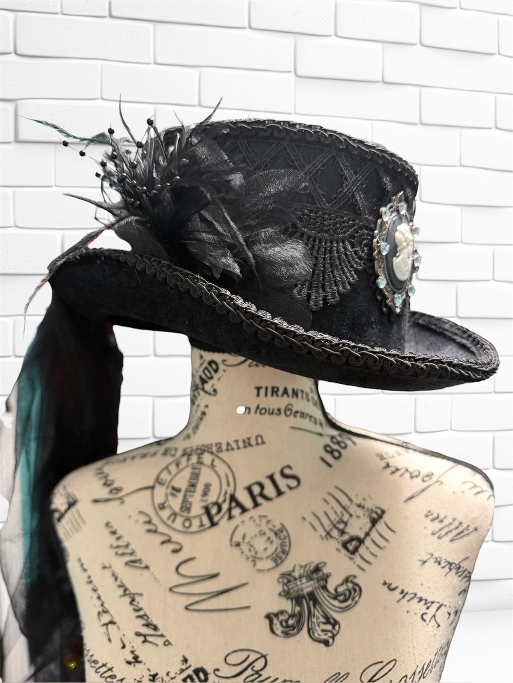 Elegant Black Feathered Steampunk Hat with Cameo Accent